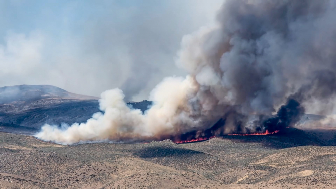 Smoke from human-caused wildfires on the Patagonian steppe are trapped in Antarctic ice. (Photo Credit: Kathy Kasic/Brett Kuxhausen, Montana State University)